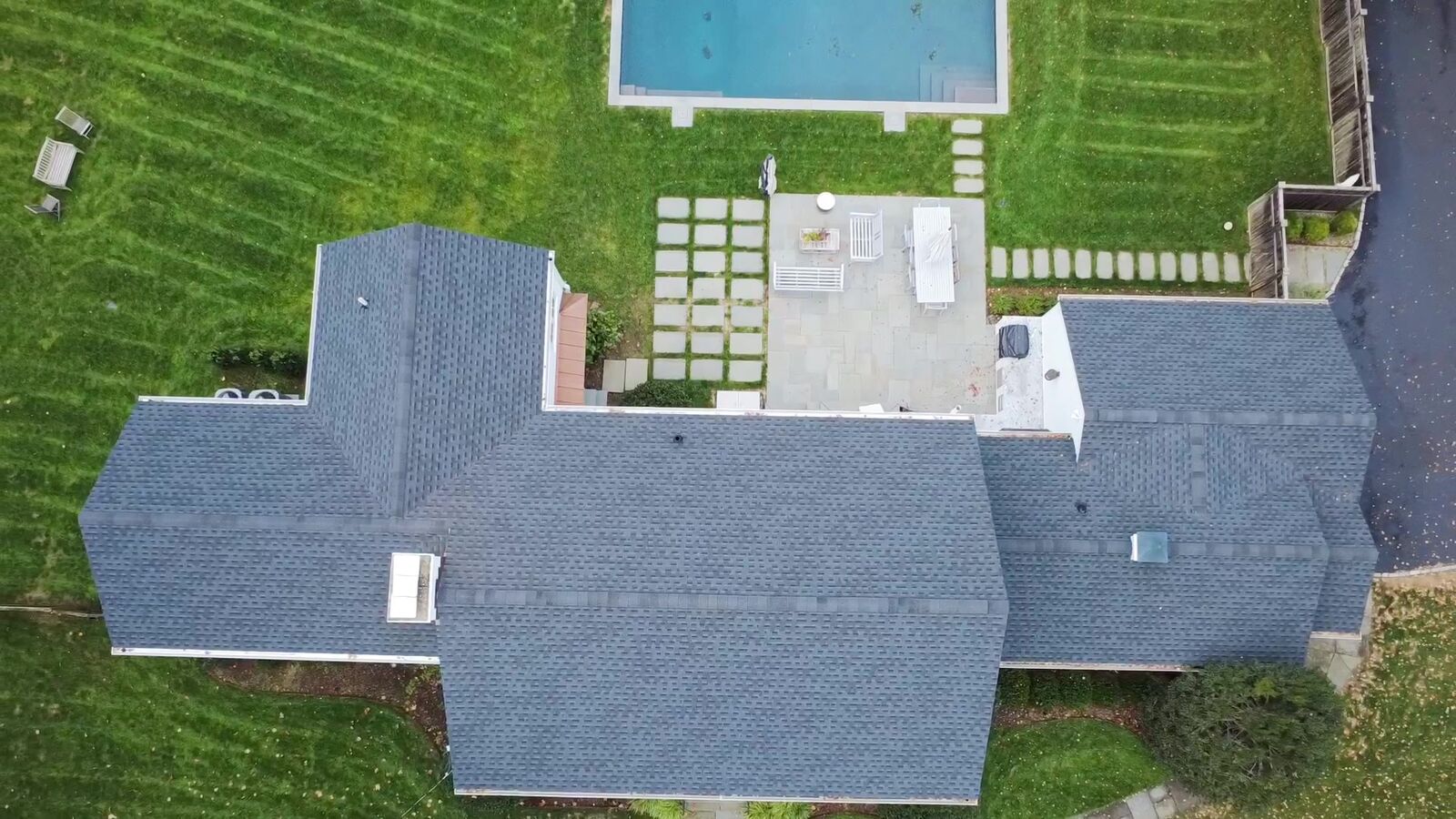 Close-up aerial of new architectural asphalt shingles installed by Charter Oak Roofing in Connecticut