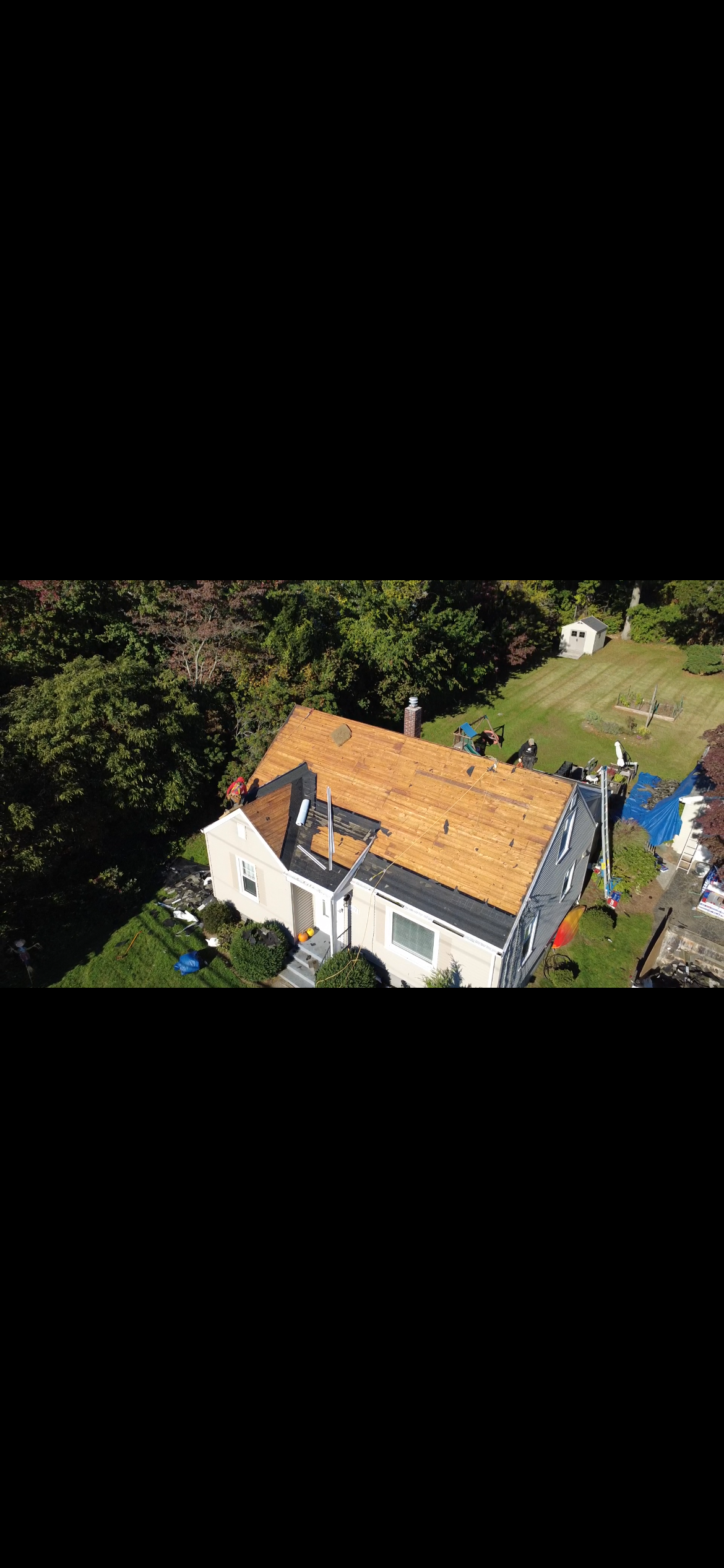 Roof stripped to new plywood decking during a replacement